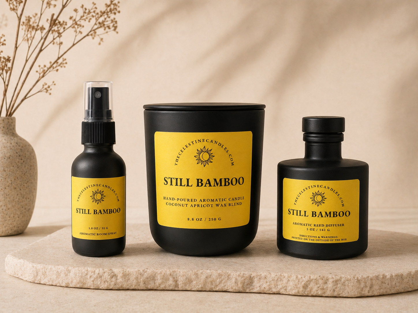 Black candle with a yellow label on a beige background