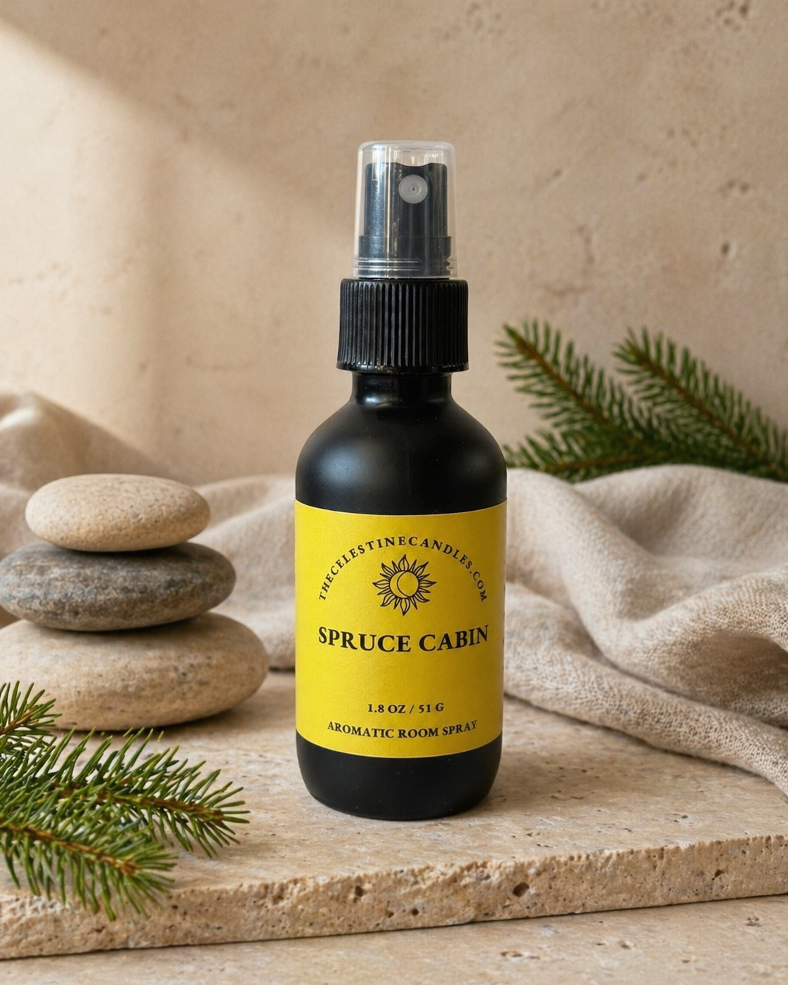Still Bamboo room spray in a premium matte black glass bottle with protective cap.