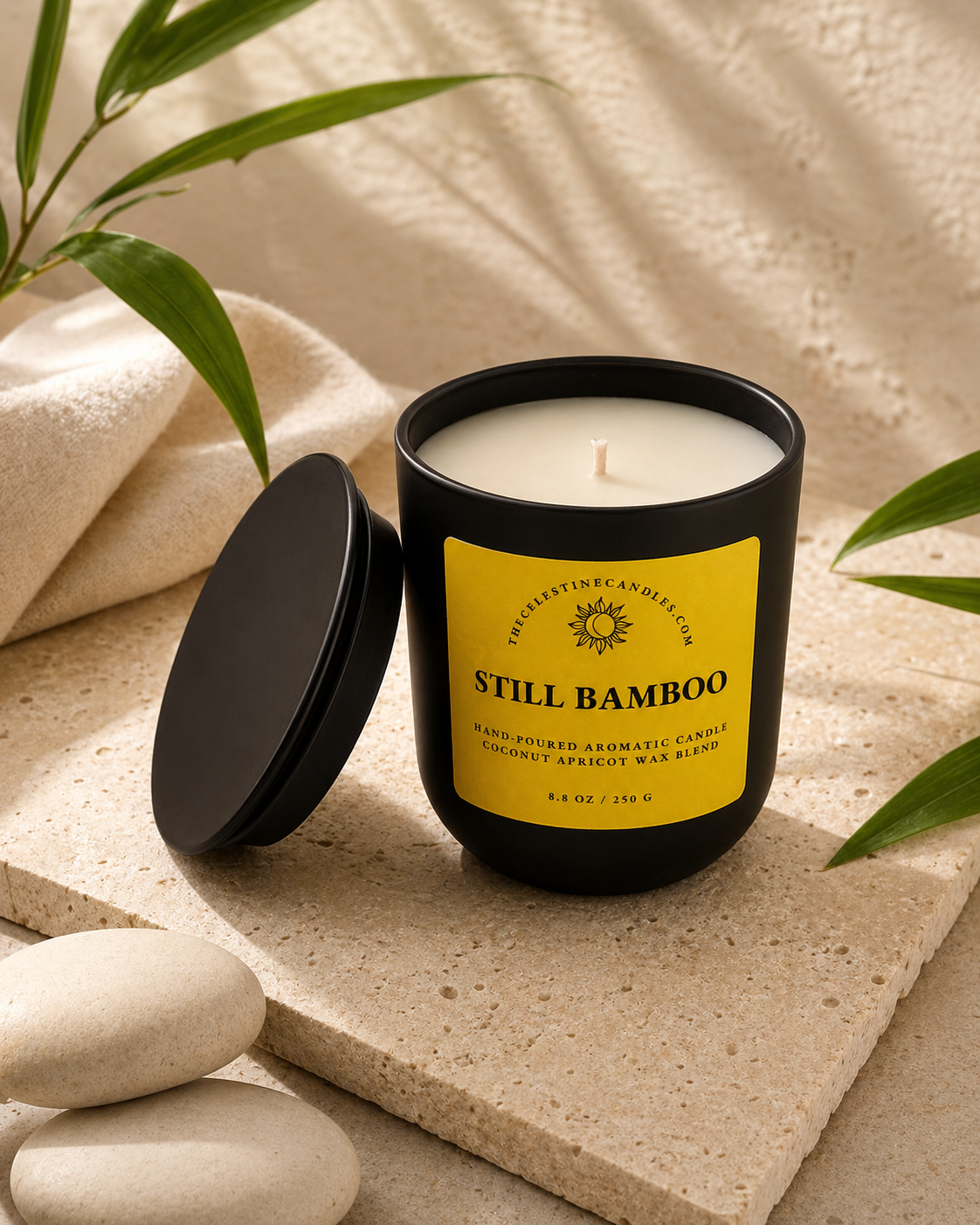 Still Bamboo coconut apricot wax candle in a premium matte black glass vessel with matching lid.