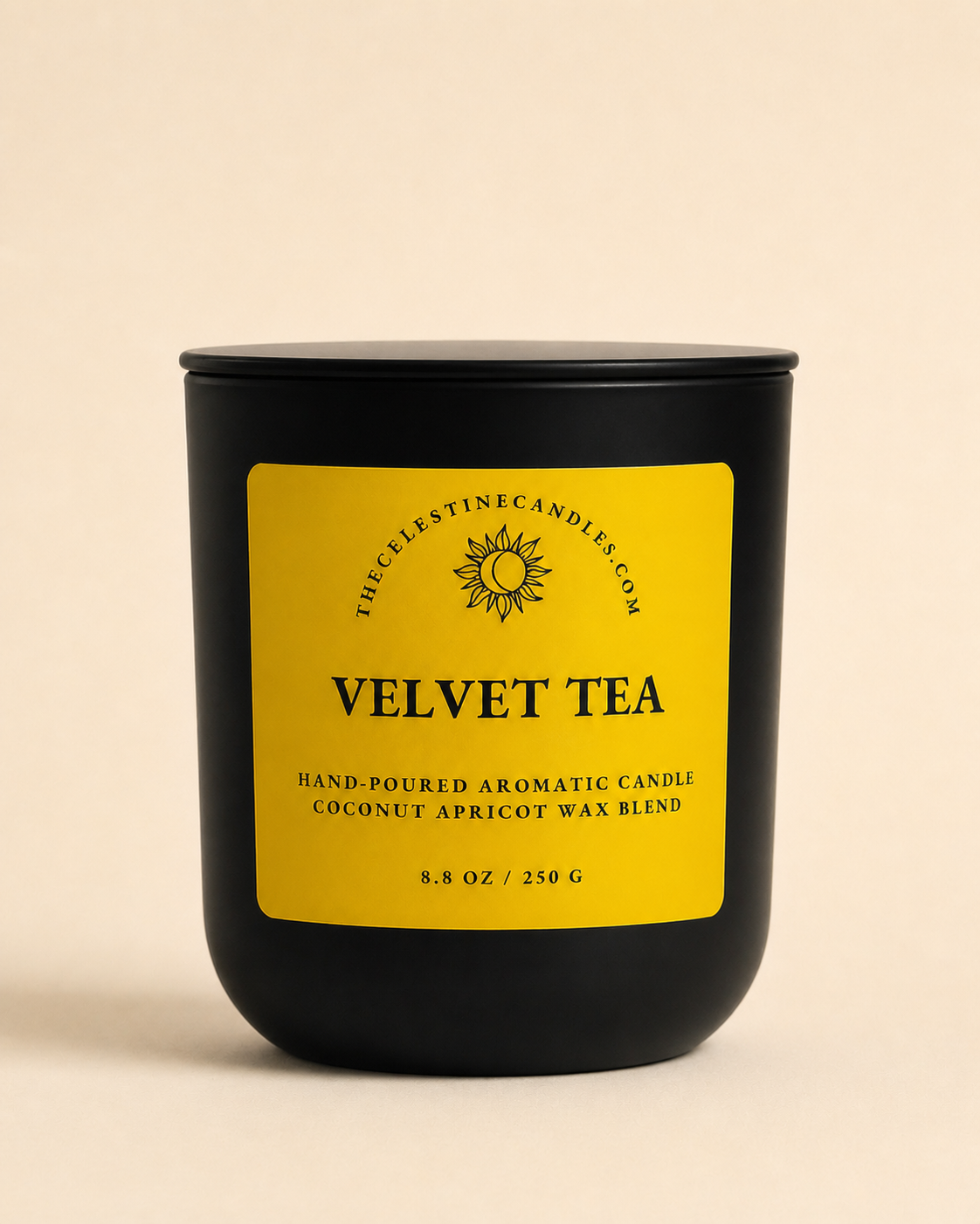 Black candle with a yellow label on a beige background