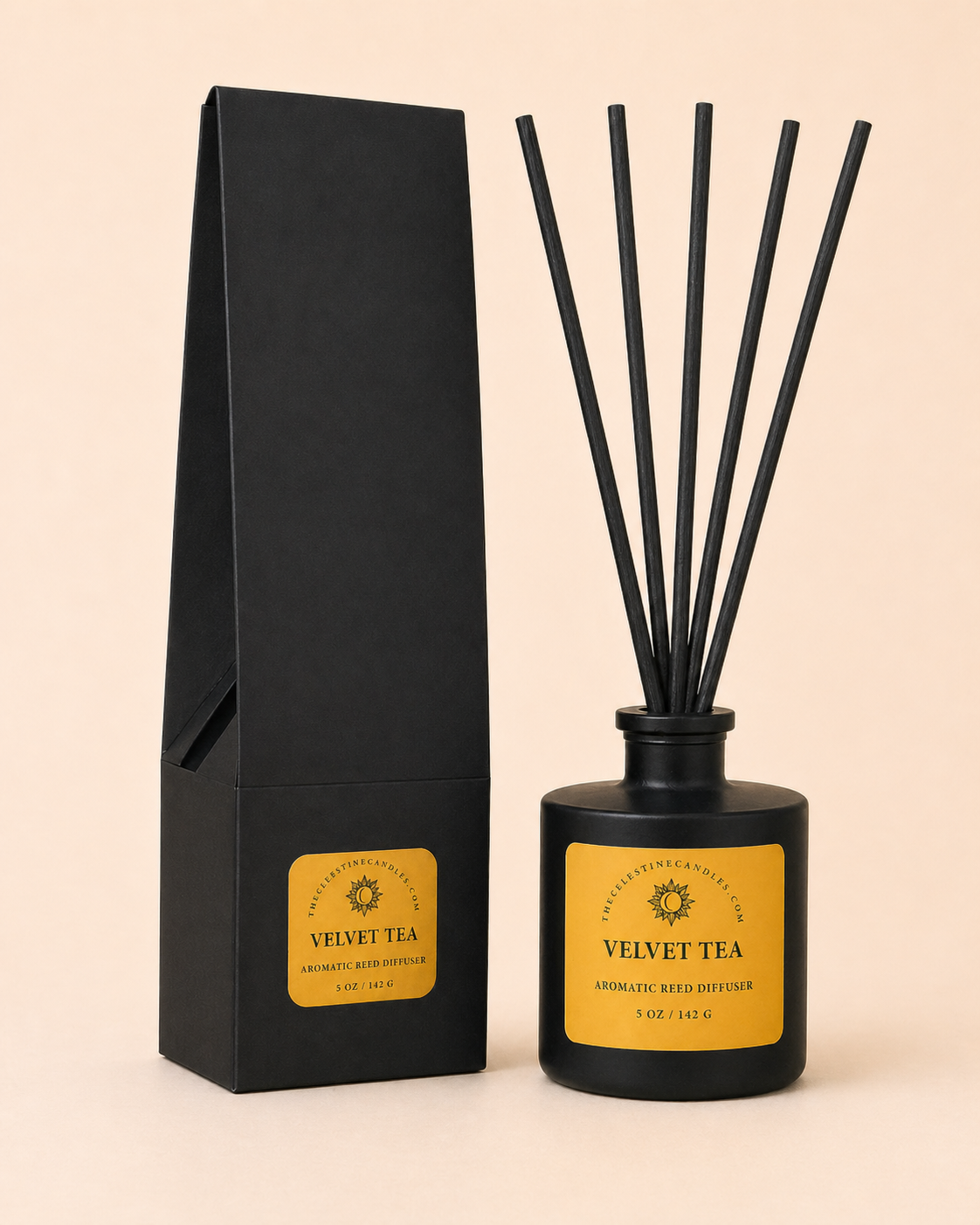 Black diffuser bottle with yellow label and packaging on a beige background