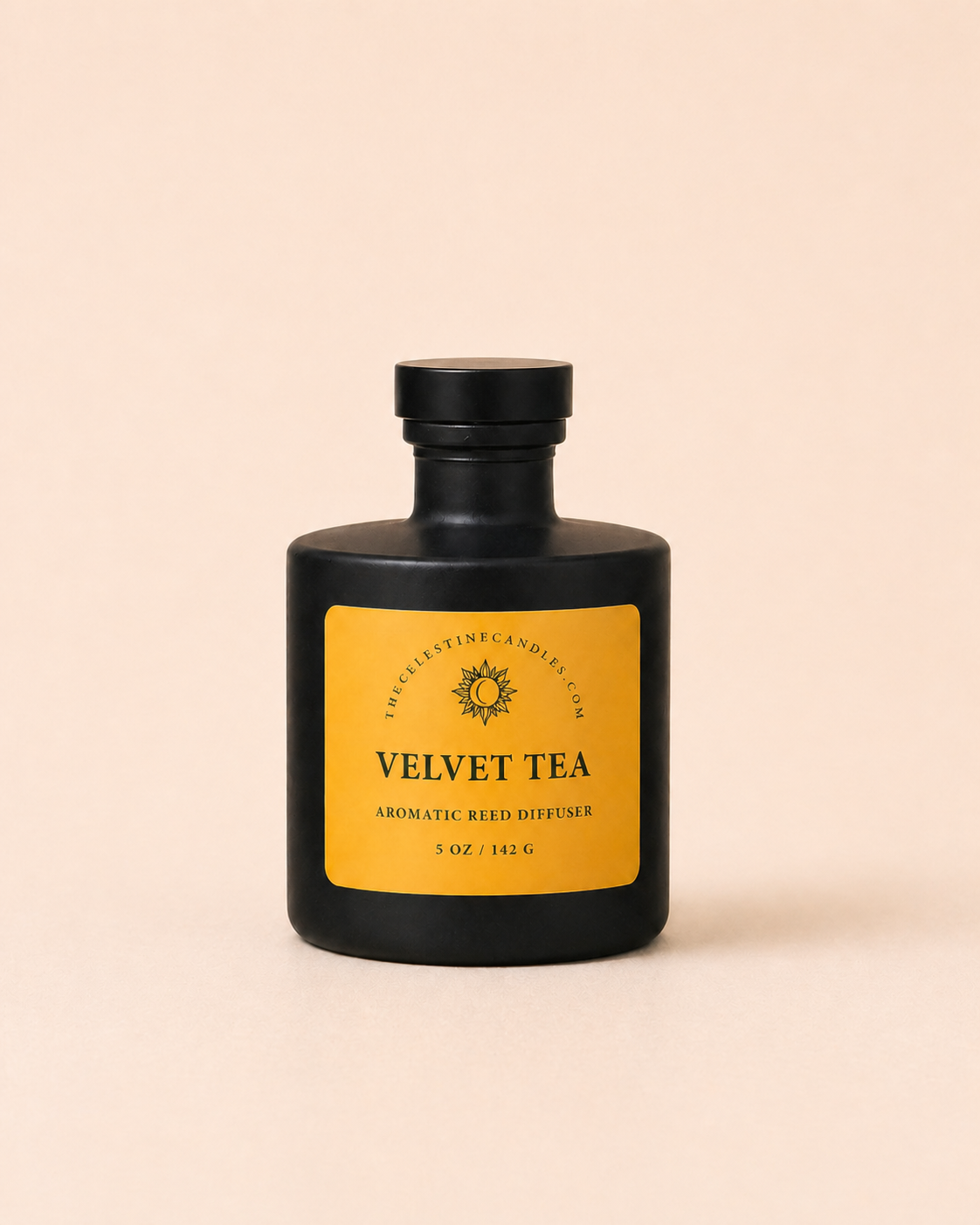 Black bottle of Velvet Tea with a yellow label on a beige background