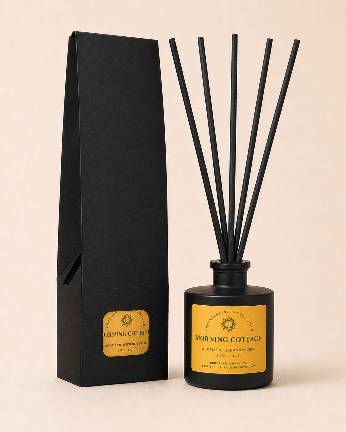 Morning Cottage diffuser bottle with black reeds and packaging on a beige background