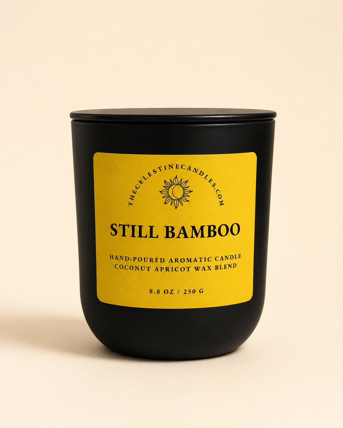 Still Bamboo coconut apricot wax candle in a premium matte black glass vessel with matching lid.