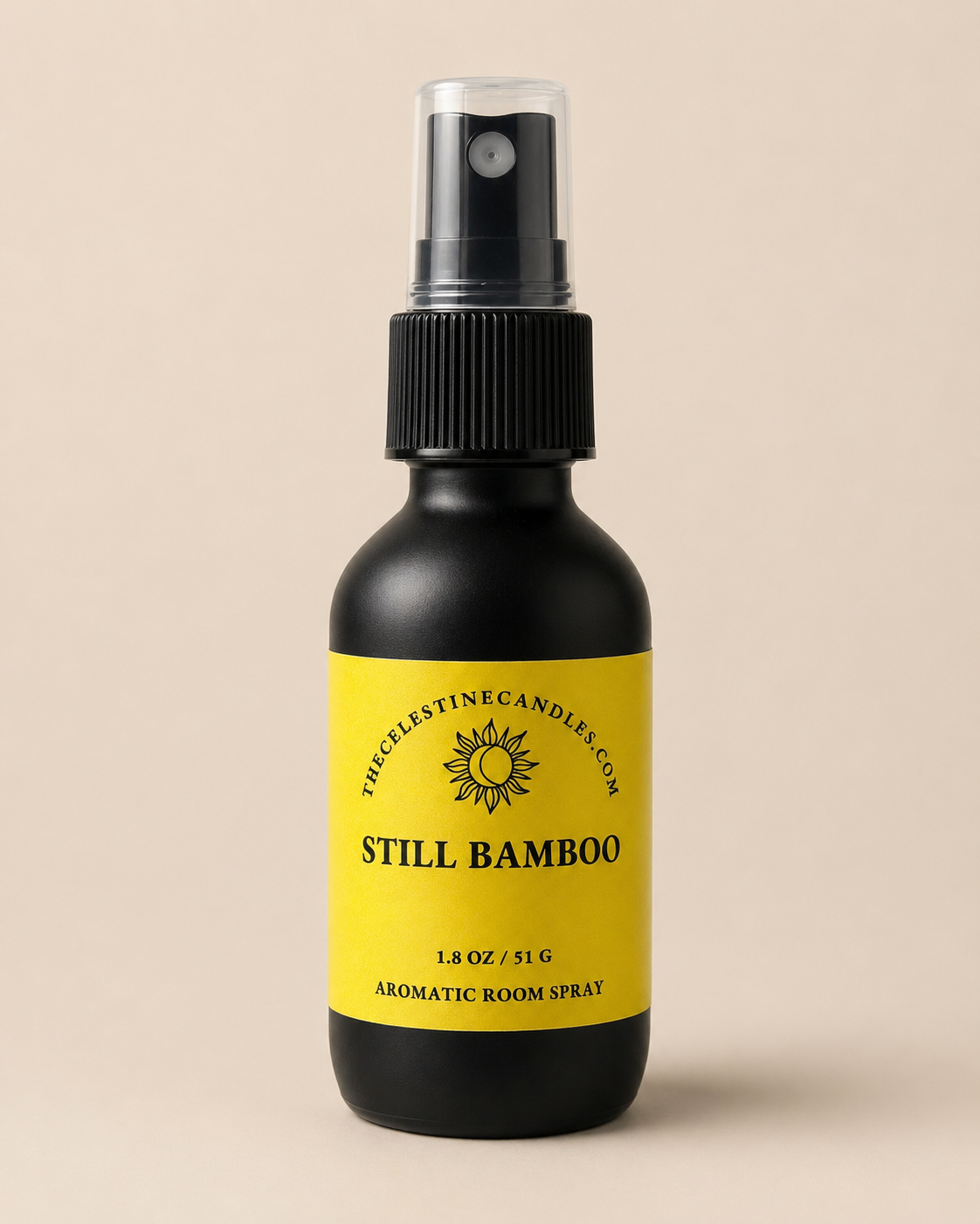 Still Bamboo room spray in a premium matte black glass bottle with protective cap.